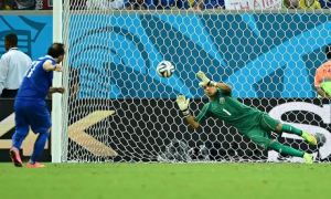 Costa Rica's goalkeeper Keylor Navas saves from Greece forward Fanis Gekas in the penalty shoot-out